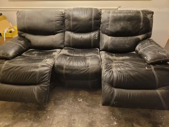 Leather. Couch With Dual Recliners 