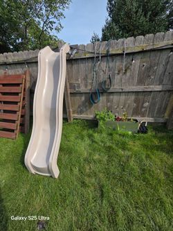Play ground slide and 2 swings