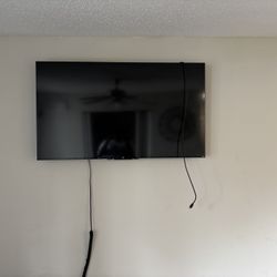 Two TCL TVs 