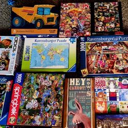 21 Different  PUZZLES**like New