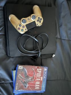PS4 with controller and 4 games