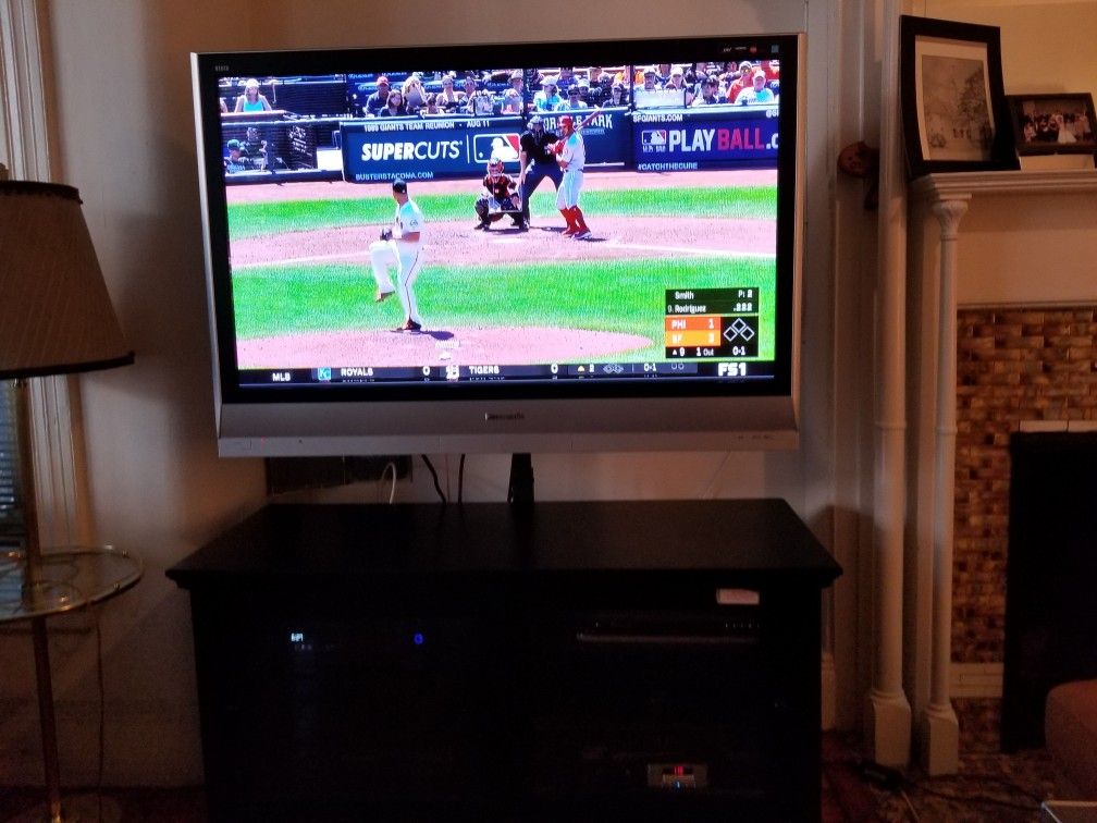 50" Panasonic TV & entertainment center w/ rotating arm