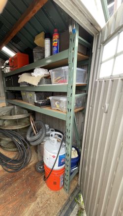 Storage Rack 6 Foot Tall 6.5 Foot Wide With 3 Shelves.
