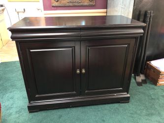 Very heavy real wood cabinet. Solid oak.