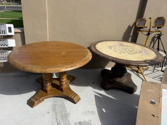 Two Round Pedestal Dining Tables
