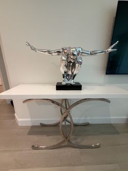 Modern console table w/ figurine