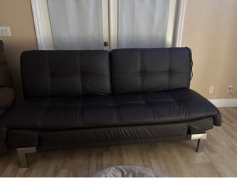 Full-size futon, couch and bed with USB and plug-in adapters Full-size futon, couch and bed with USB and plug-in adapters