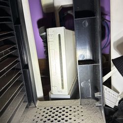 Wii System Games And Tower Stand. 