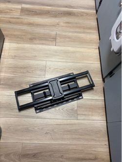 full-motion articulating TV wall mount.