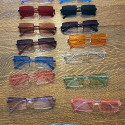 15 pairs of colorful sunglasses
