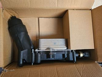 NEW Oil Filter Housing & Oil Cooler (contact info removed)3AF – Jeep Dodge Ram 3.6L
