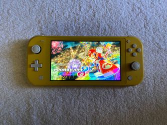 NINTENDO SWITCH LITE With Over 7000 GAMES INSTALLED