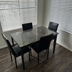 30x48 In Black Table With Chairs