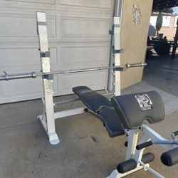 Olympic Weight Bench / Bar.     130 Dollars 