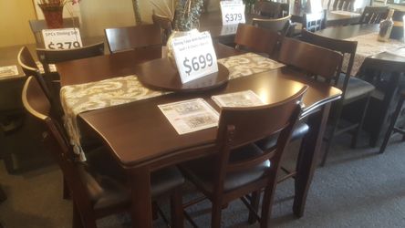 Brand new pub high ding set with 6 chairs