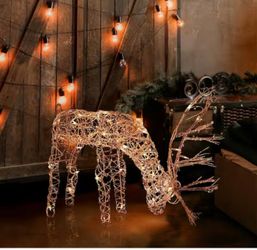 24 in Tall Rattan Grazing Reindeer Decoration with Halogen Lights 29 in Long