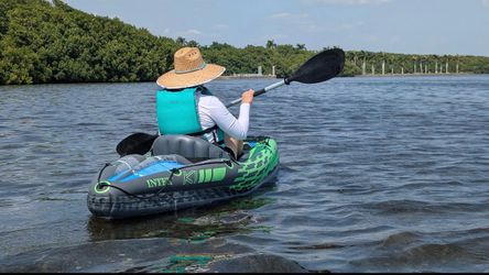 Pair of inflatable kayaks with life vests