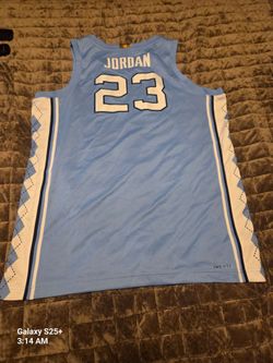 Jordan 12's Sneakers and carolina jersey