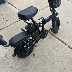 New Electric Bike  Just Posted , Loaded  No Miles On It   Goes Up To 40 Miles. Plus  Up To 8 Hours On Battery.  Many Features  Alarm  Signals 