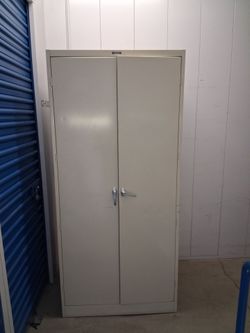 To doors metal storage cabinet  $  250