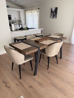 Almost new table and chairs! $180