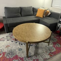 Ashley furniture Franston circular gold coffee table