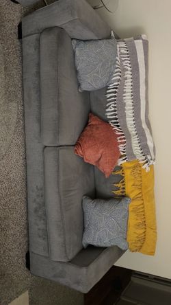 Gray Fabric Two-Seat Sofa with a glass table