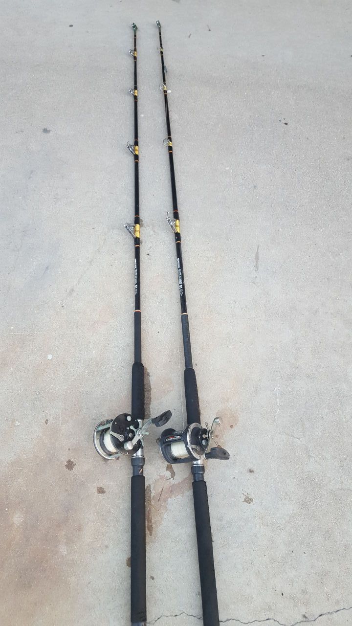 2 Master blackfinn 21 6.5 ft. poles w/ Penn reels