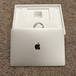 2020 MacBook Pro 13" Intel i5, 8GB RAM, 256GB SSD.