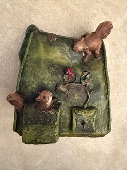 Decorative flower pot/planter - squirrels over open old bag