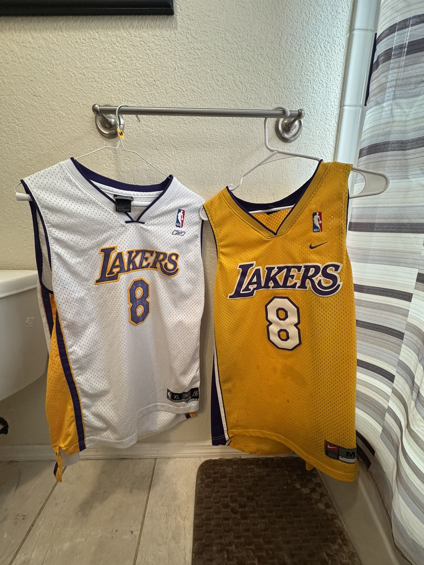 Two Laker Jerseys