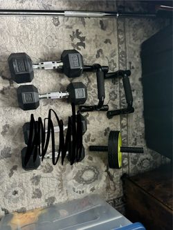 Barbell, dumbbells , and workout gear
