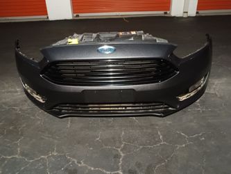 2015-2019 Ford Focus complete front bumper with All the accessories oem.