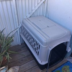 Large travel kennel.