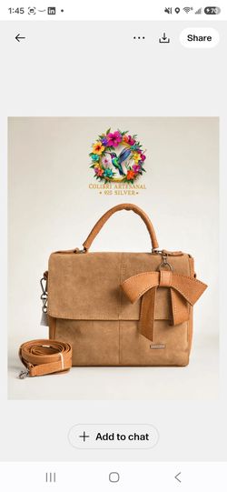 Bolso Artesanal de piel de gamuza.
