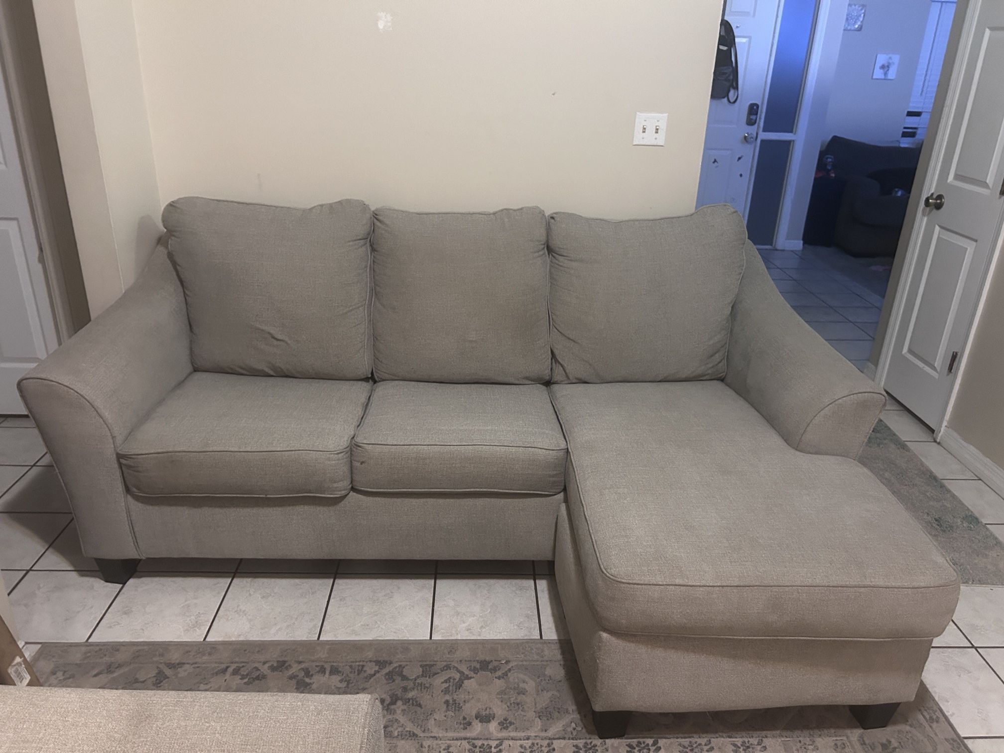 Ashley Furniture Gray Sectional With Pull Out Bed And Free Delivery