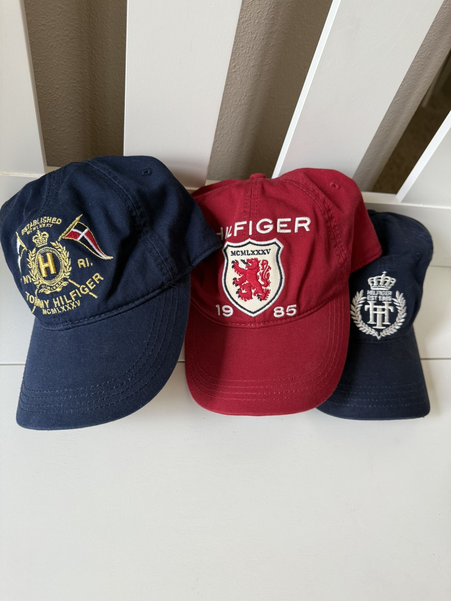 TOMMY HILFIGER caps each $15