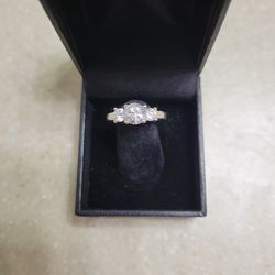 14 k White Gold Ring With Cz's.  Weight is 5.3 grams
