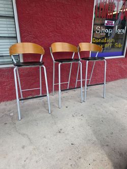 Set of 3 bar height stools, used and priced accordingly