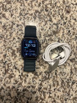 Apple Watch Ultra 2 GPS + Cellular 49mm Black. New with 1 year Apple warranty. Comes with Charger