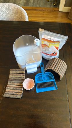 Hamster sand bath, floral food bowl, bendable logs, mini duster and sand to get you started!