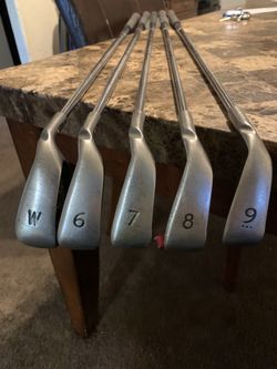 Ping K-15 clubs and 1 Cobra driver