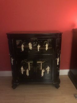 Antique asian liquor cabinet