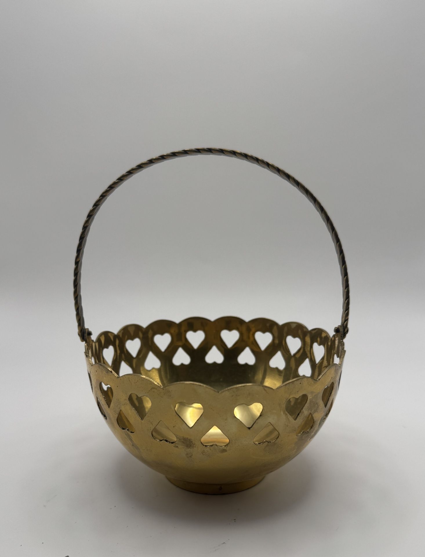 Brass Basket With Heart Cutouts And Braided Handle