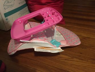 Baby seat for bath include some toys and read book for baby