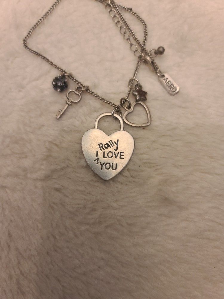 Antiqued Silver Tone Aero 1987