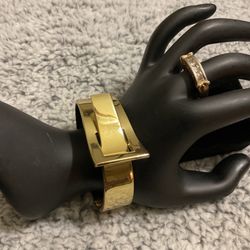 Gold Tone Lapse Bangle Bracelet With Spring 