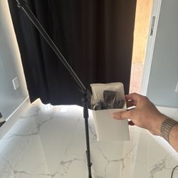 Microphone stand with clips for mic