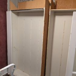 Free on the curb 2 wood shelving/cabinet.