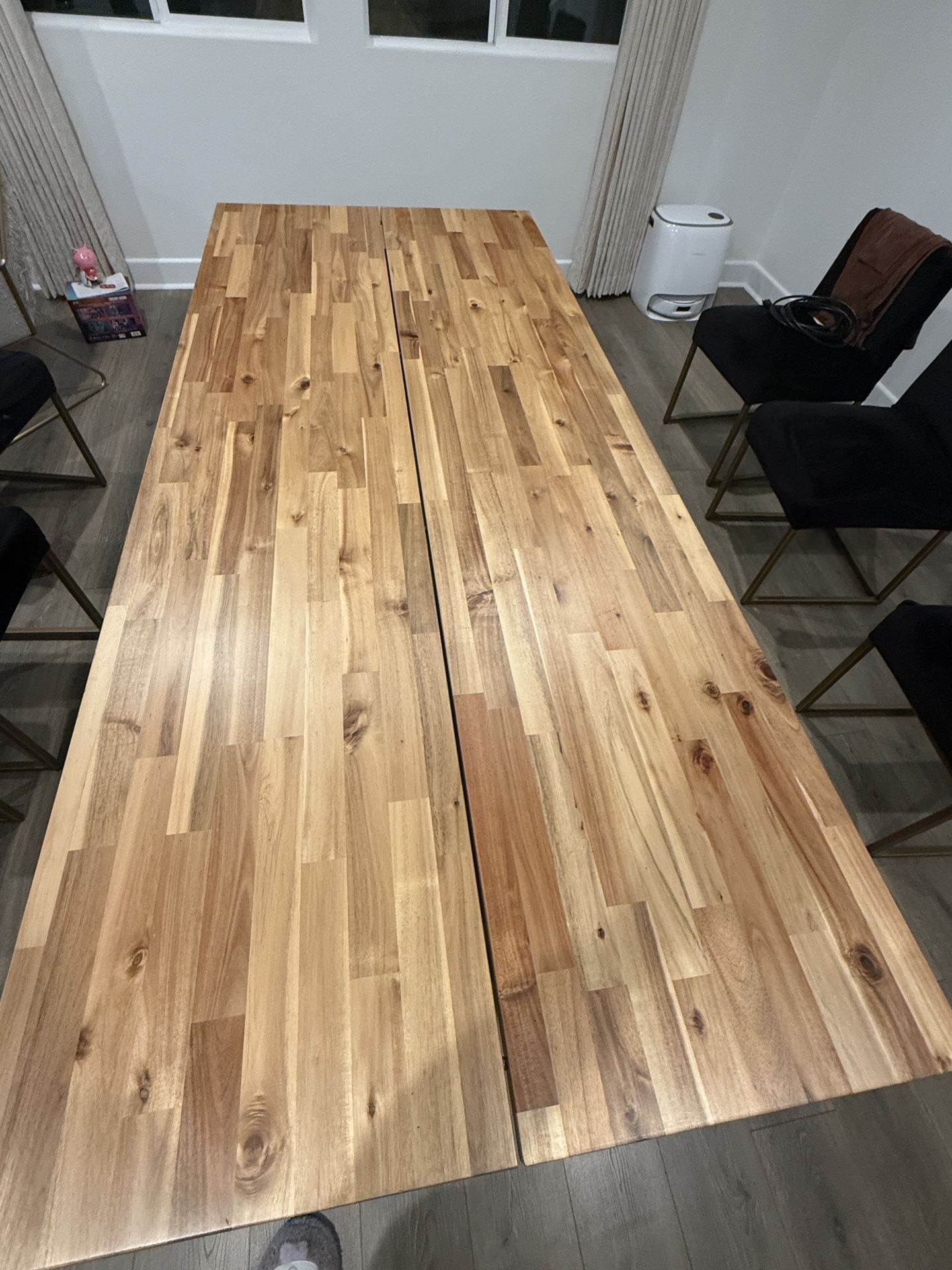 IKEA SKOGSTA dining table in acacia wood with black legs